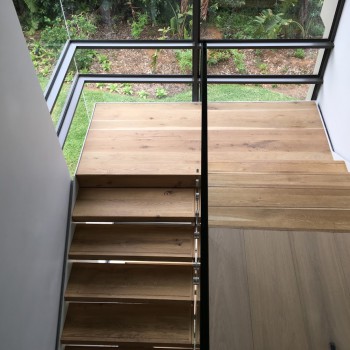 Floating Oak Staircase with Panga Panga inlays