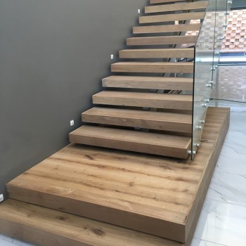 Centre spine Oak Staircase with Panga Panga inlays