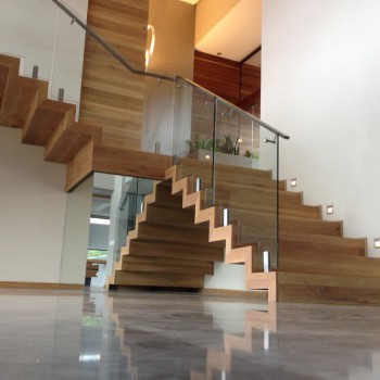Floating Oak staircase with Panga Panga inlays